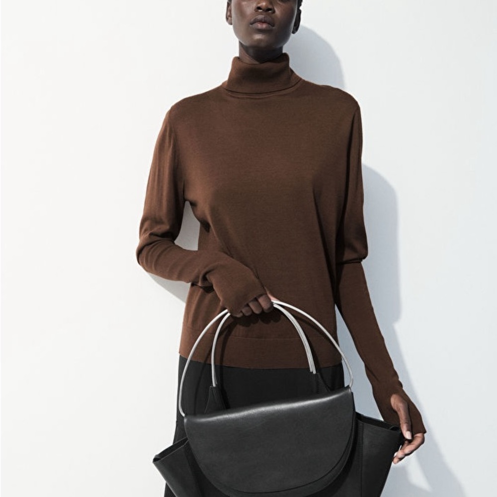 THE WOOL ROLL-NECK SWEATER by COS